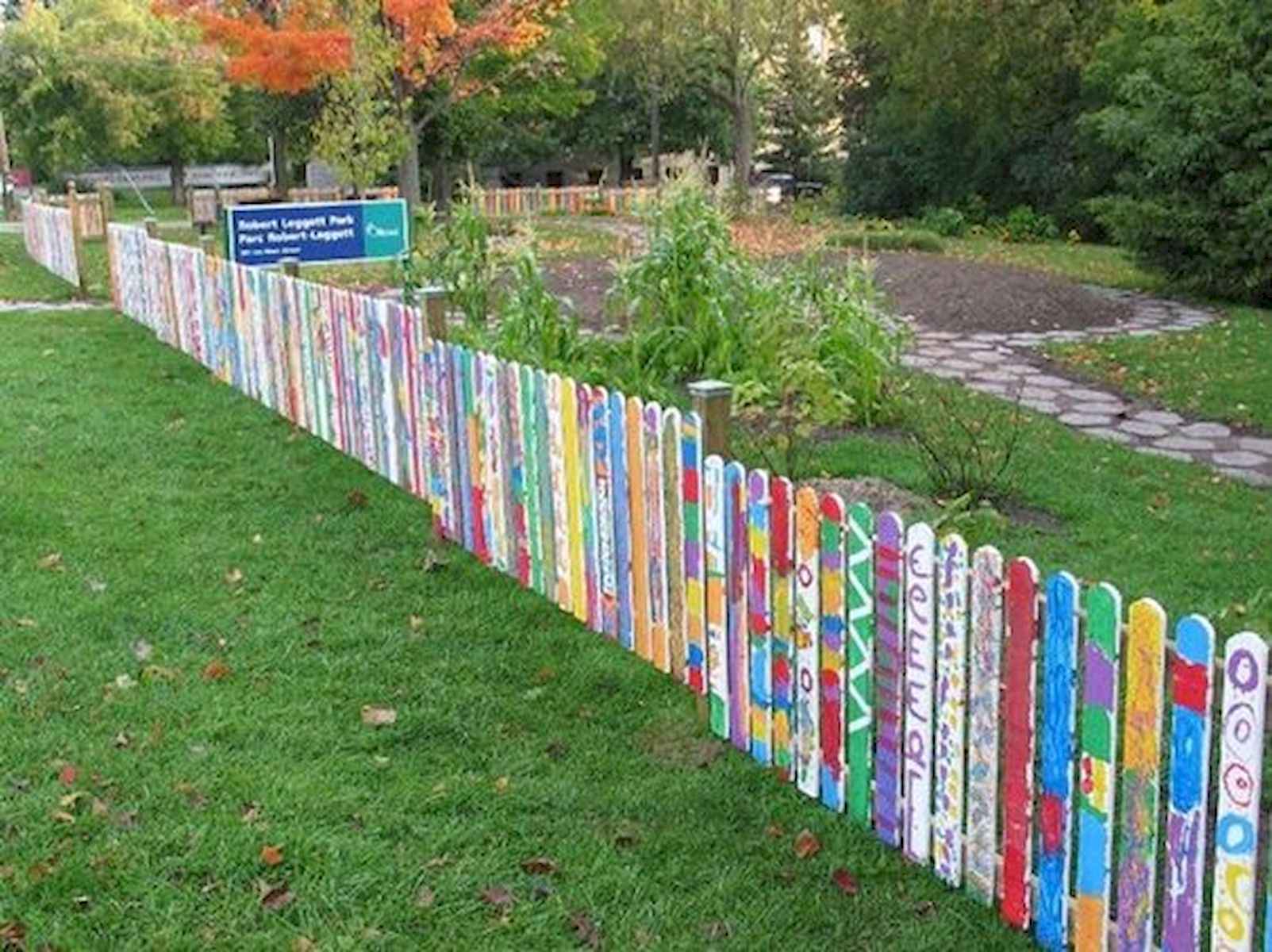 colorful painting fence posts purple